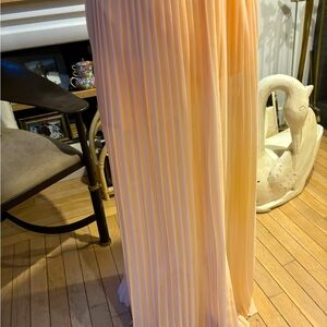 Light pink pleated skirt. Elastic waist band